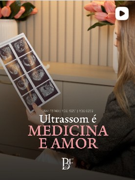 Dra. Bruna Facco segurando impress&otilde;es de ultrassom